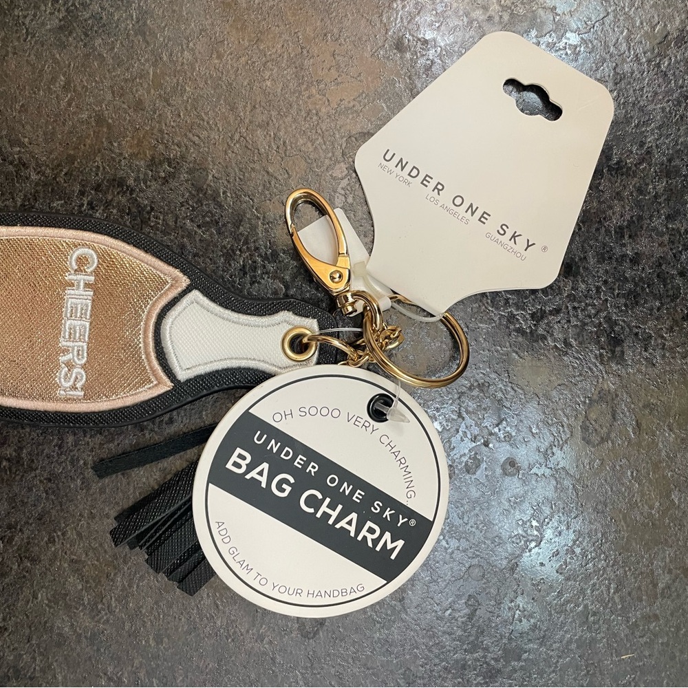 FREE WITH PURCHASE! Under One Sky Cheers Bag Charm - Gold and Black